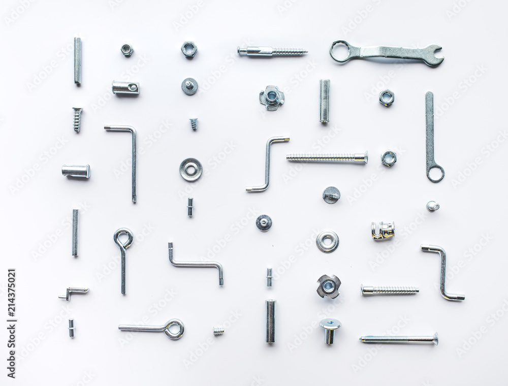 Collection set of house repair tools, wrenchs, screw, bolts on white background,flat lay pattern Collection set of house repair tools, wrenchs, screw, bolts on white background,flat lay pattern
