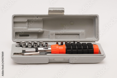 Reversible screwdriver. A set of screwdriver nozzles on a white background.