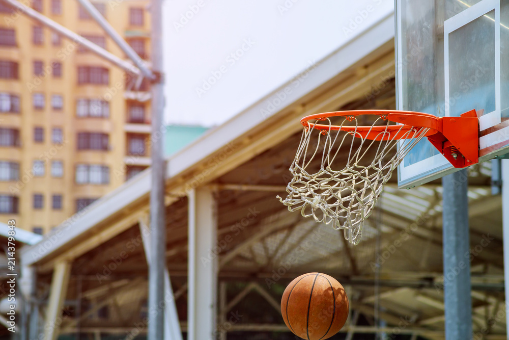 A motion of basketball swishing through the hoop A motion of basketball swishing through the hoop