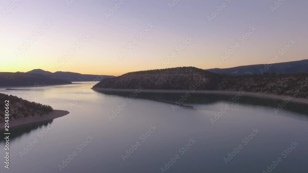 Mostly Vertical flight over a Colorado Rocky Mountain Lake with a tough of a zoom out towards the end. Mostly Vertical flight over a Colorado Rocky Mountain Lake with a tough of a zoom out towards the end.