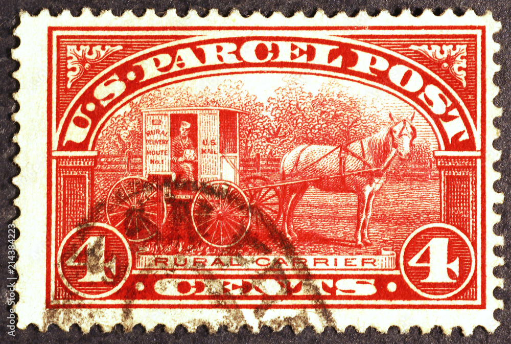 Old postal carrier on vintage postage stamp