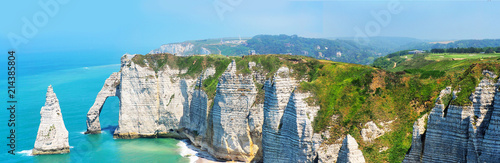 Picturesque panoramic landscape on the cliffs of Etretat. Natural amazing cliffs. Etretat, Normandy, France, La Manche or English Channel. Coast of the Pays de Caux area in sunny summer day photo