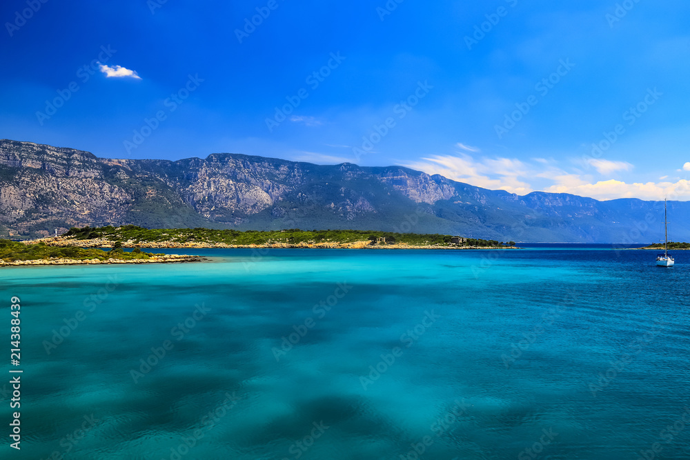 The picturesque Gekova gulf in the Aegean Sea - clear turquoise water  against the backdrop of the mountains