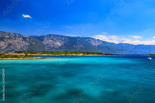 The picturesque Gekova gulf in the Aegean Sea - clear turquoise water against the backdrop of the mountains