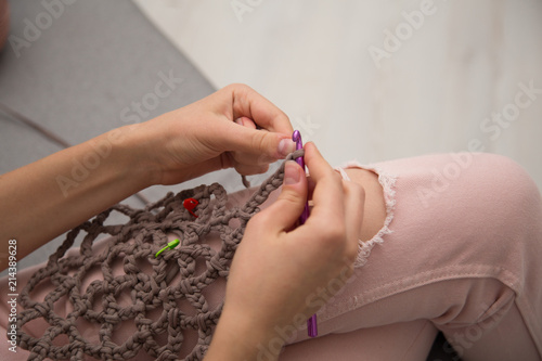 Knitting workshop. Girls crocheting a string bag. Plastic Pollution Problem solution