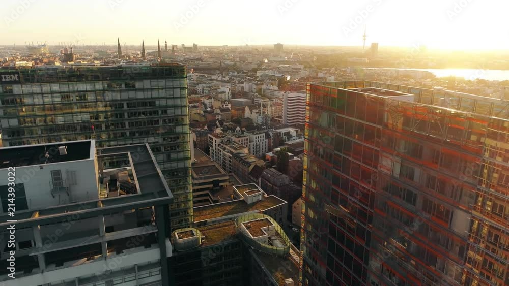 Aerial view of Hamburg (Germany). Cityscape and big modern buildings at sunset. A sunset Aerial shot of skyscrapers of Hamburg Business Centre. Aerial view of Hamburg (Germany). Cityscape and big modern buildings at sunset. A sunset Aerial shot of skyscrapers of Hamburg Business Centre.