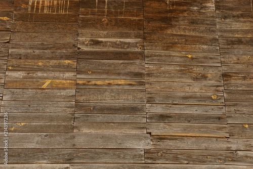 gray brown wooden texture of small boards in the wall