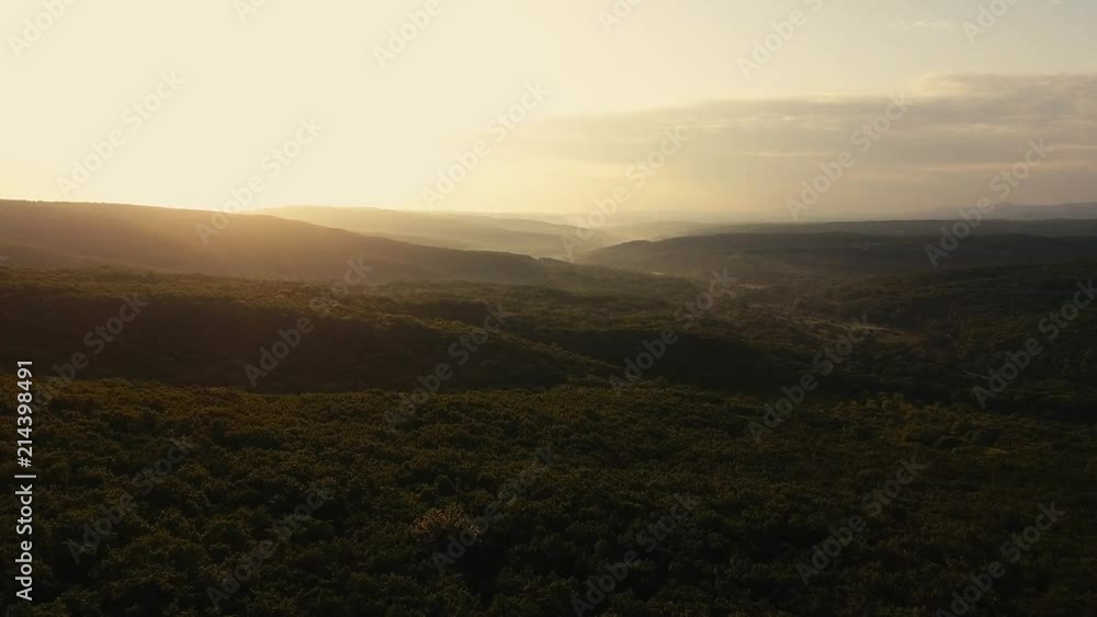 A long and slow aerial helicopter shot of beautiful green mountain ridges A long and slow aerial helicopter shot of beautiful green mountain ridges