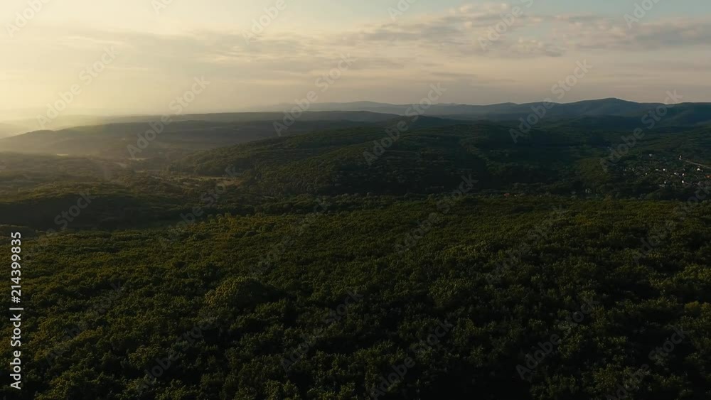 A long and slow aerial helicopter shot of beautiful green mountain ridges A long and slow aerial helicopter shot of beautiful green mountain ridges