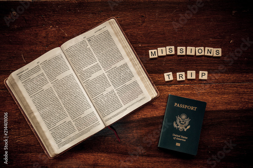 Flat lay of an open Bible and text