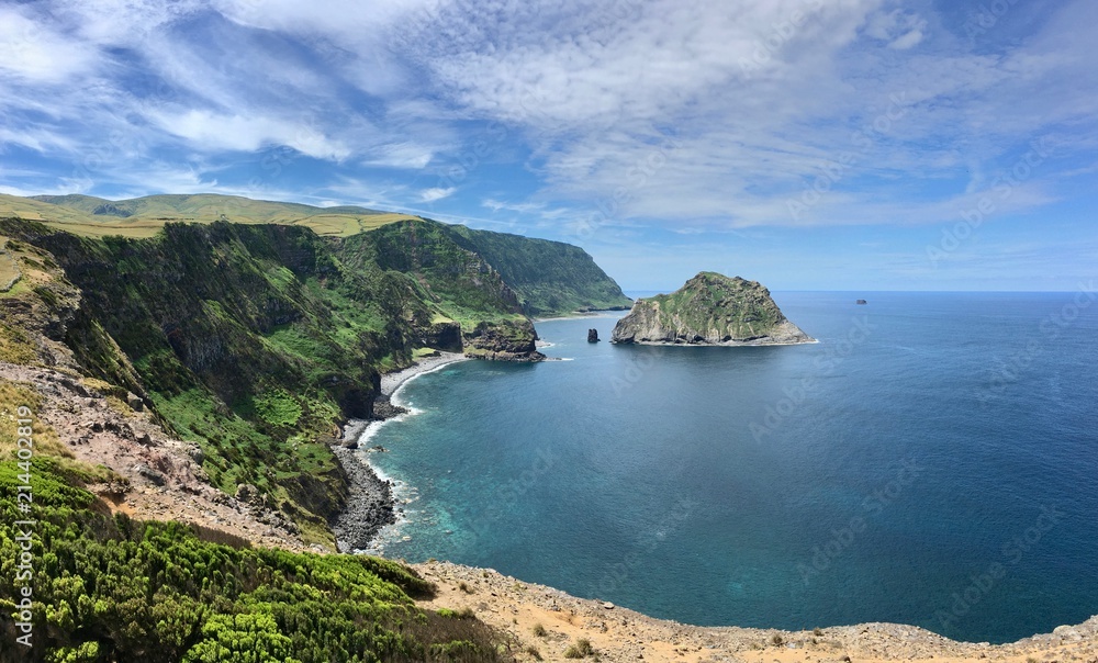 Coastline of Flores Island and a islet