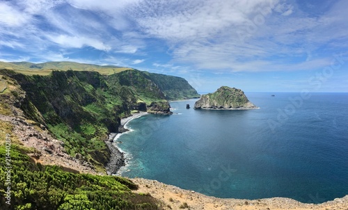 Coastline of Flores Island and a islet