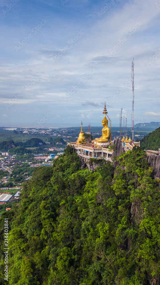 Buddha on the top Mountain of Wat Tham Seua (Tiger Cae) , Krabi,Thailand