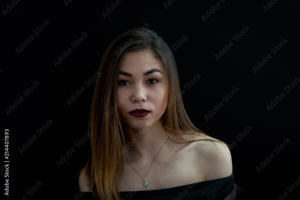 Girl on a black background. Portrait Girl on a black background. Portrait