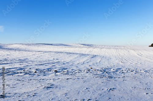 rural field covered with snow