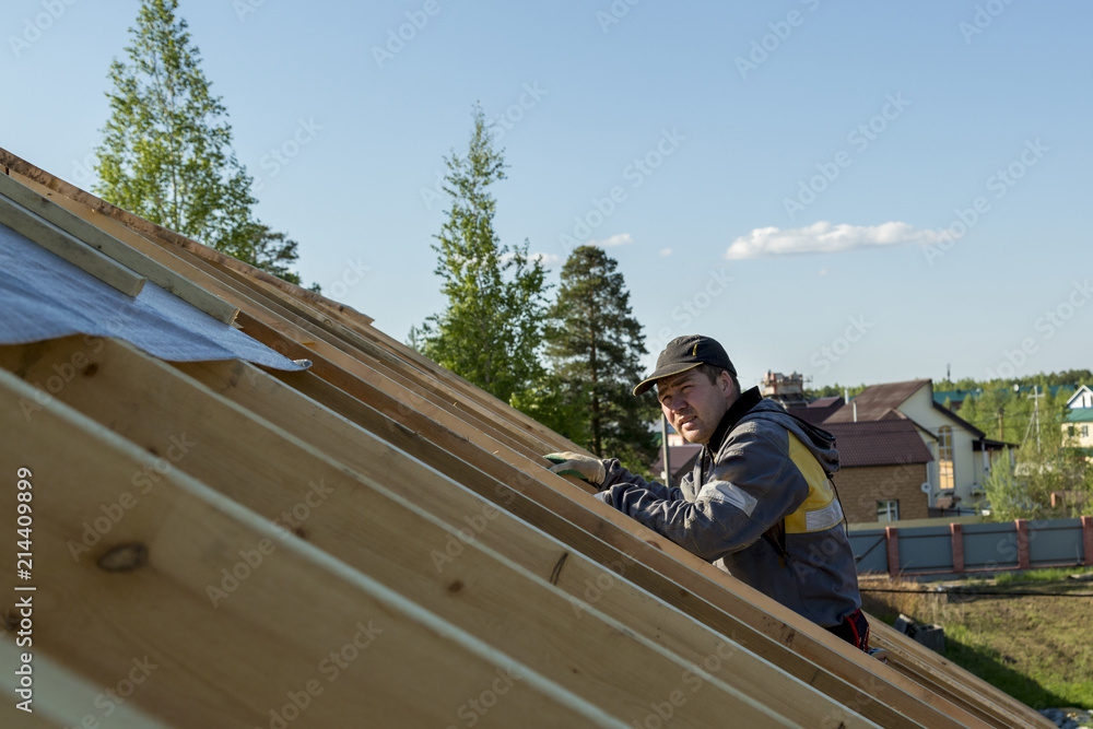 The builder on the roof The builder on the roof