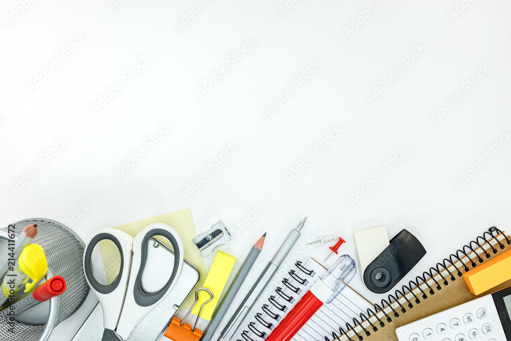 assortment of stationary and writing tools for office on white table background assortment of stationary and writing tools for office on white table background