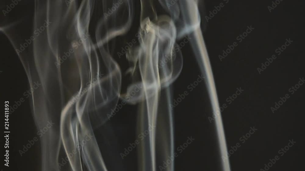 incense smoke on dark background incense smoke on dark background
