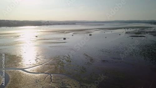 Drone footage of beautiful coastal area in England. Perfect for water sports and boat rides. Lympstone is a tourist location and located in East Devon in South West England. photo