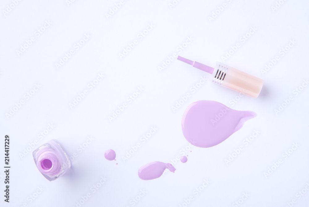Drops and blobs from spilled nail polish on a white background Drops and blobs from spilled nail polish on a white background