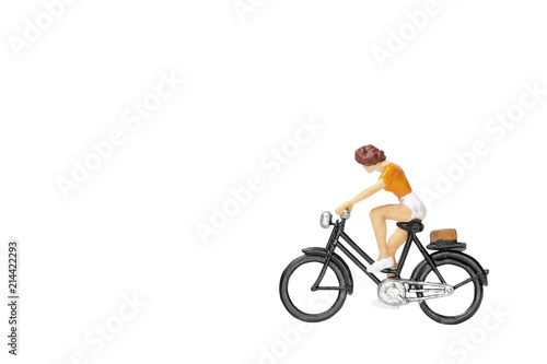 Fototapeta Naklejka Na Ścianę i Meble -  Miniature people travellers with bicycle isolate on white background with clipping path.