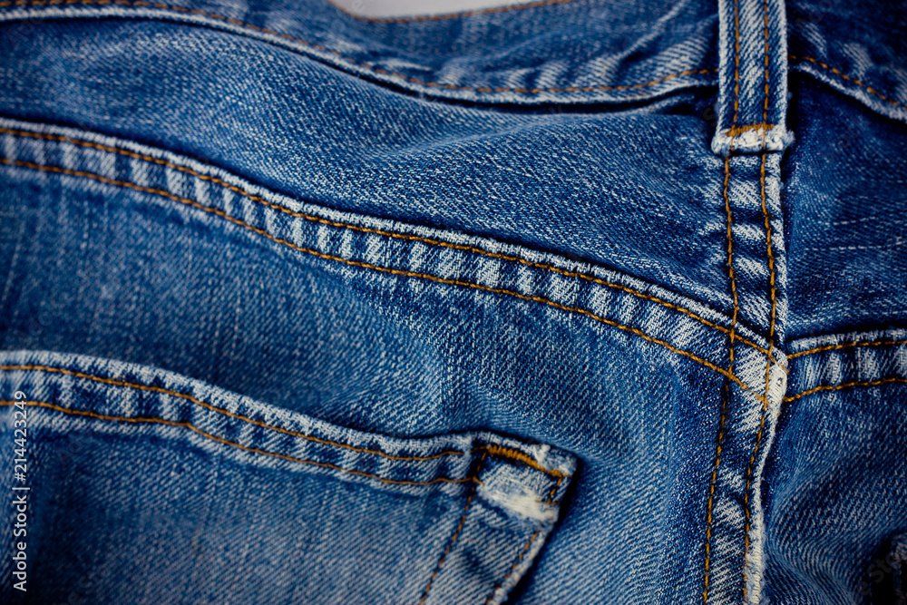 old blue jeans seam detail cloth of denim for pattern and classic background close up
old blue jeans seam detail cloth of denim for pattern and classic background close up