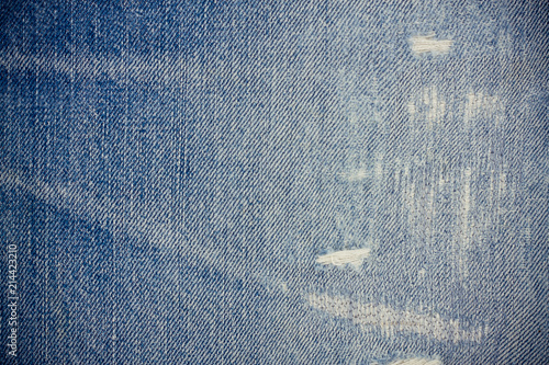 old jeans background worn out denim pattern classic texture blue background of denim canvas
