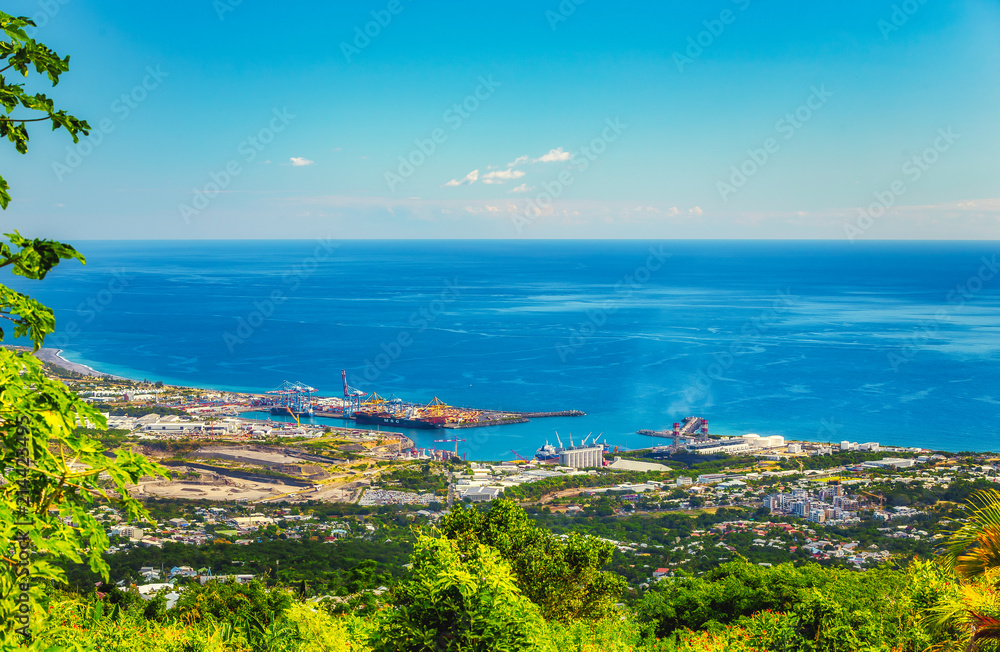 Point of view on the city Le Port, pole of exchange and transit of  merchandises on Reunion island in the Indian Ocean Stock Photo | Adobe Stock