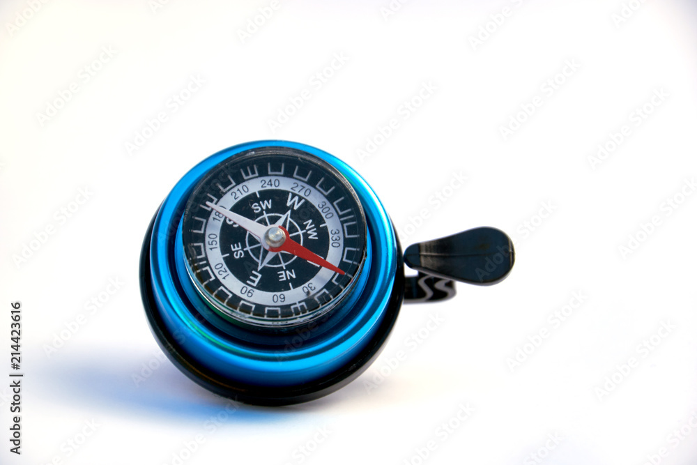 Small compass build inside bicycle handlebar isolated on white background Small compass build inside bicycle handlebar isolated on white background