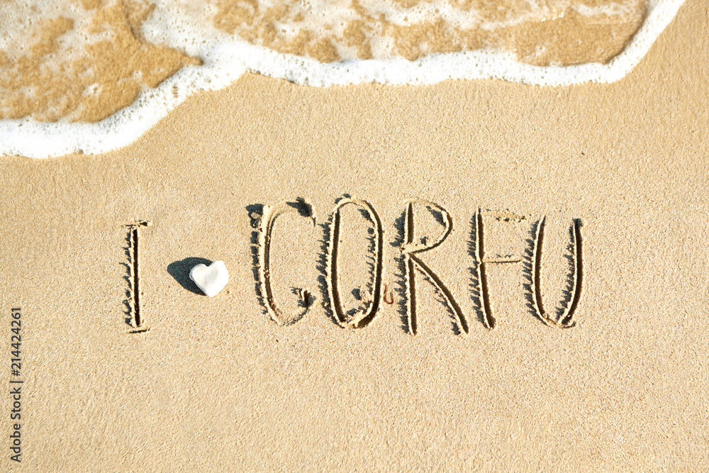 Fototapeta premium The inscription on the sand by the sea - Corfu.