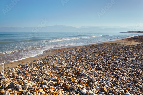 Pebble beach of the island of Corfu.