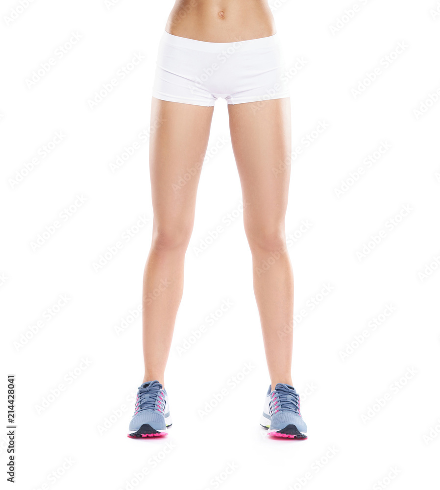 Sporty and beautiful body of young and fit woman isolated on white Sporty and beautiful body of young and fit woman isolated on white