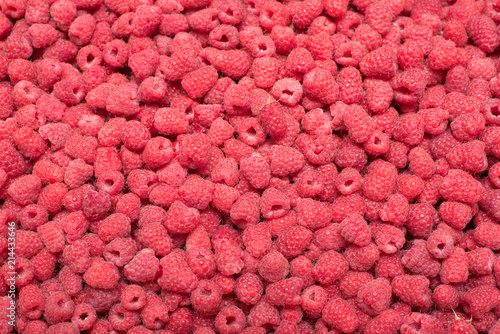Background of ripe raspberries. Close up