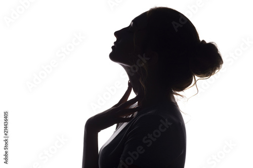 silhouette of beautiful sensual girl, woman face profilee on white isolated background, concept of beauty and fashion