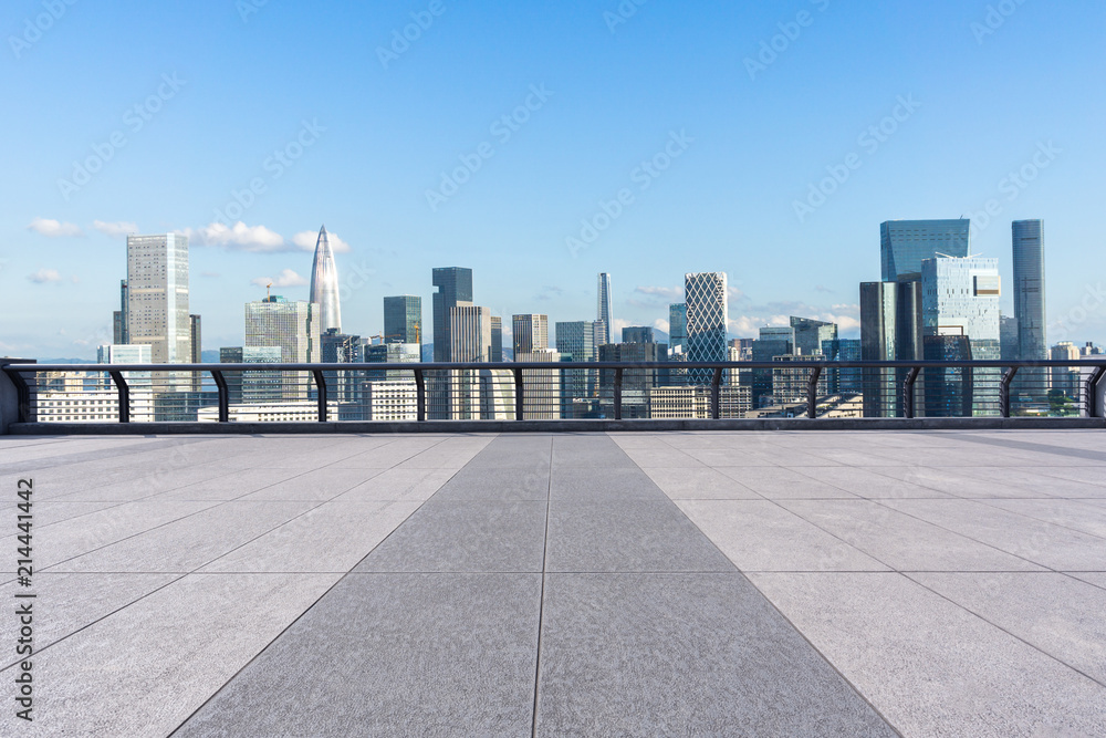 empty square with city skyline empty square with city skyline