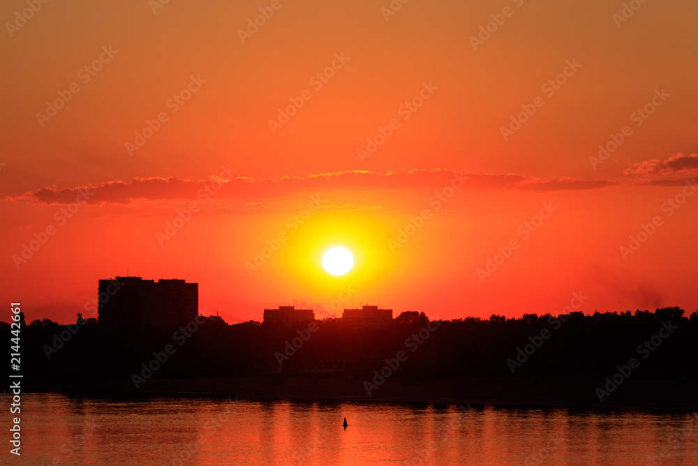Orange sunset over a river Dnieper in Kremenchug city, Ukraine Orange sunset over a river Dnieper in Kremenchug city, Ukraine