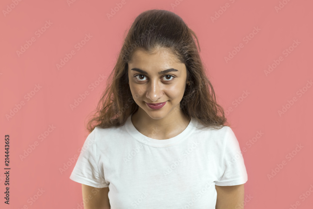 Lovely Indian girl with beautiful eyes. Portrait of a young smiling woman, brunette. Lovely Indian girl with beautiful eyes. Portrait of a young smiling woman, brunette.