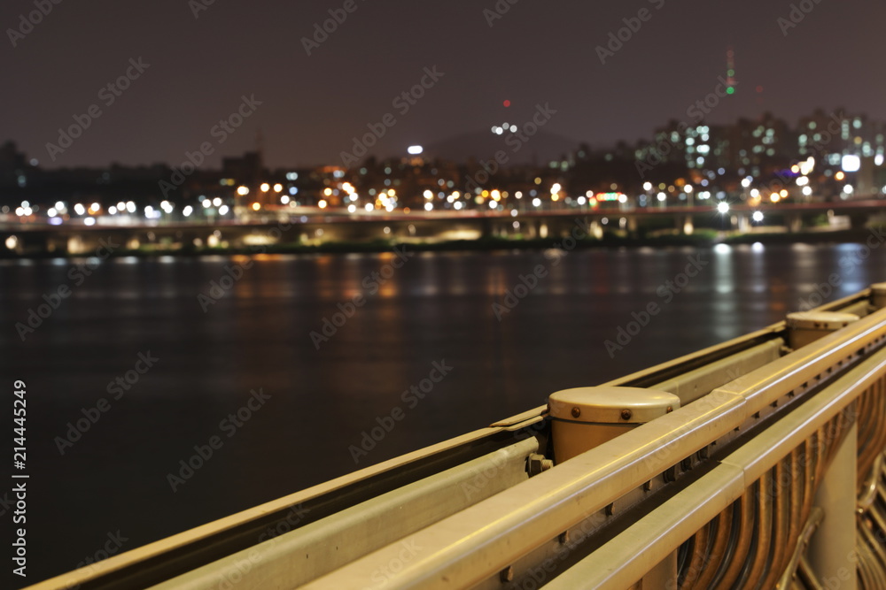 Banpo Bridge in Seoul, South Korea. Night view of a city with a river.
