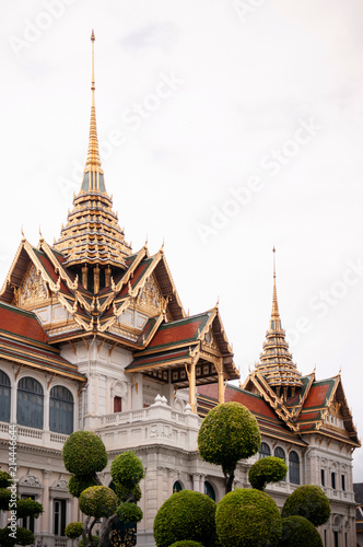 Golden artisan facade and roof of Bangkok Grand Palace "Chakri Maha Prasat" throne hall © PixHound