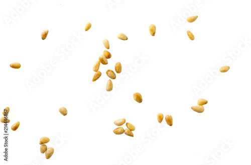 Unshelled pine nuts isolated on white