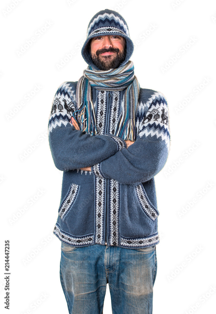 Man with winter clothes with his arms crossed