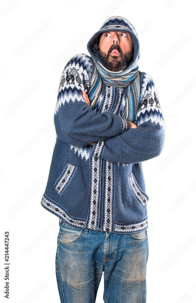 Man with winter clothes making unimportant gesture Man with winter clothes making unimportant gesture