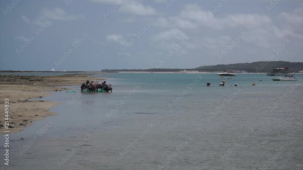People in a Beach Scene - Fishing - Relaxing - Maceió, Alagoas, Brazil People in a Beach Scene - Fishing - Relaxing - Maceió, Alagoas, Brazil