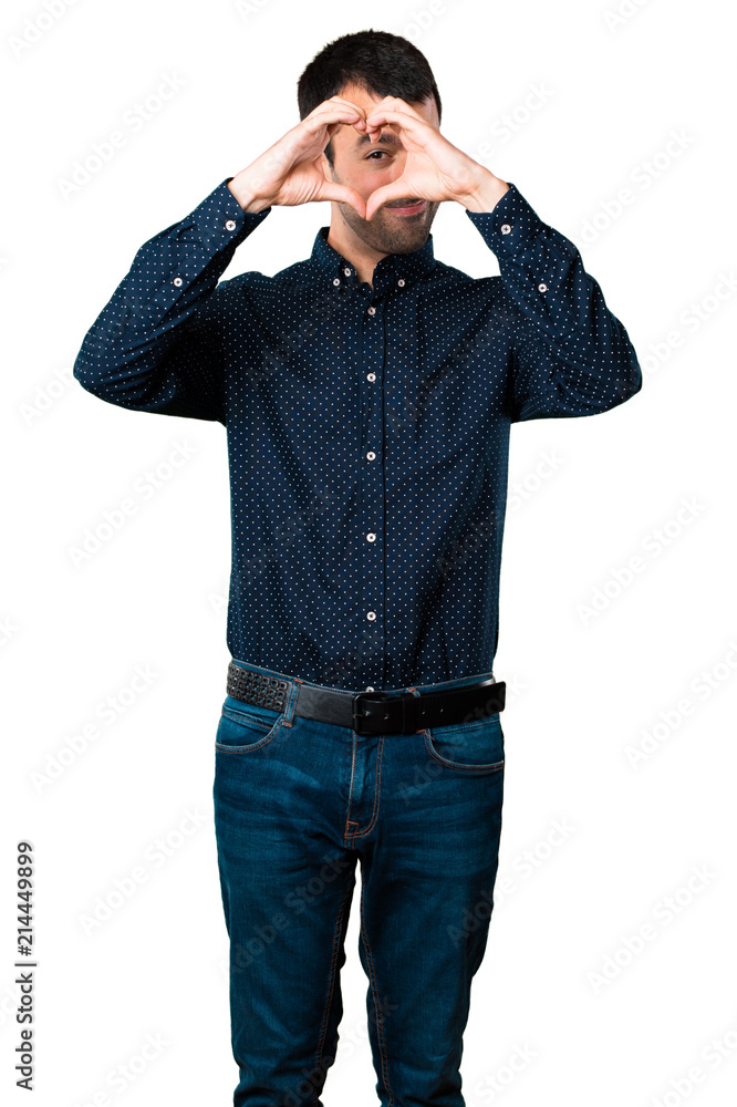 Handsome man making a heart with his hands on isolated white background Handsome man making a heart with his hands on isolated white background