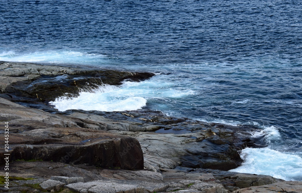 waves hitting the rugged shoreline, Newfoundland Canada waves hitting the rugged shoreline, Newfoundland Canada