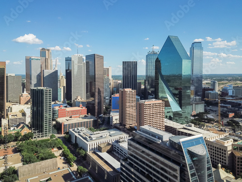 Aerial view financial district in Downtown Dallas, Texas, USA. Modern skyscrapers under summer cloud blue sky. Metropolis and cityscape background