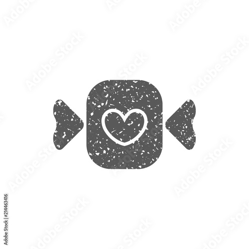 Candy icon in grunge texture. Vintage style vector illustration.