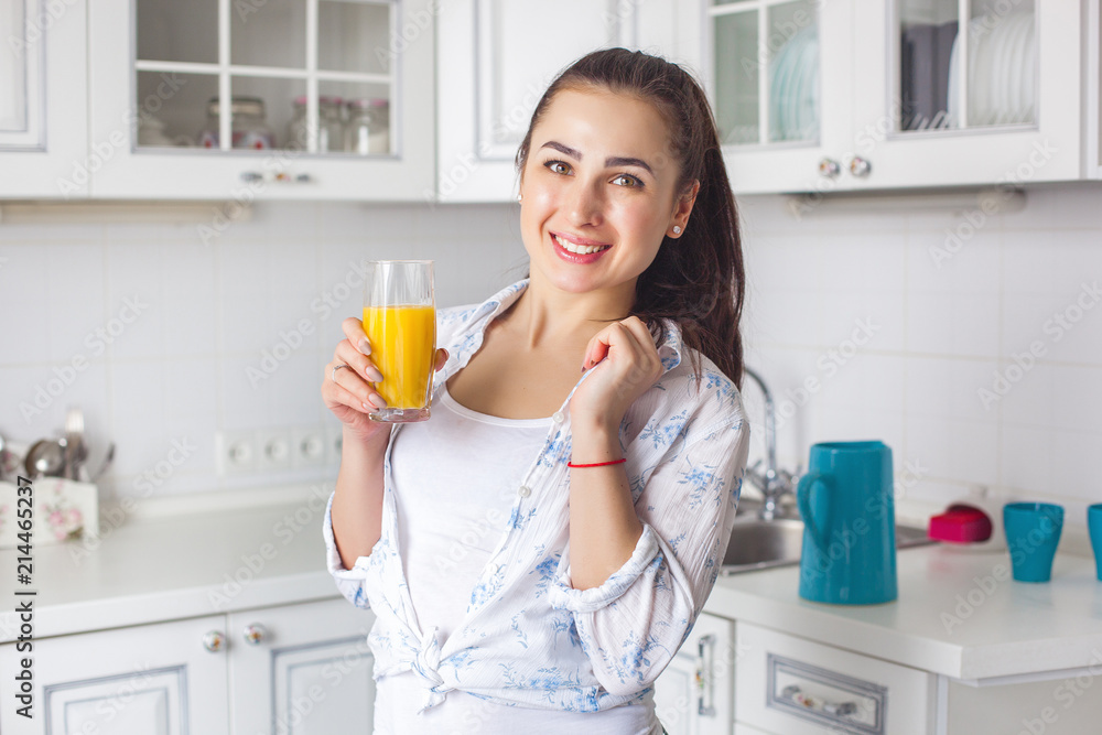 Close up portrait of young attractive woman drinking fresh juice Close up portrait of young attractive woman drinking fresh juice