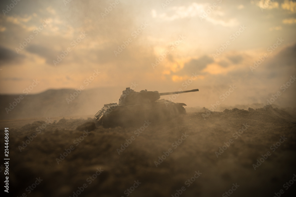 Fototapeta premium War Concept. Military silhouettes fighting scene on war fog sky background, World War Soldiers Silhouettes Below Cloudy Skyline at sunset. Attack scene.