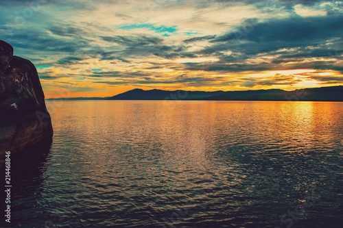 A golden sunset at Nkhata Bay, Lake Malawi, Malawi photo